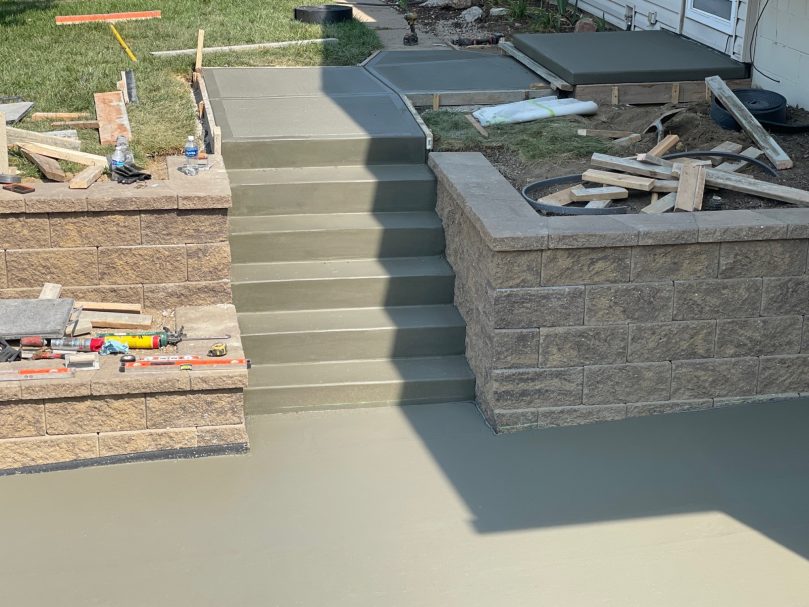 A complete 3-part concrete project A completed 3-part project! This transformation included a beautiful new driveway, functional stairs, and a welcoming front stoop.