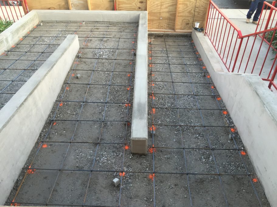 Forms and rebars place next to staircase to prep for concrete pour