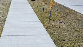 New smooth concrete sidewalk in neighborhood